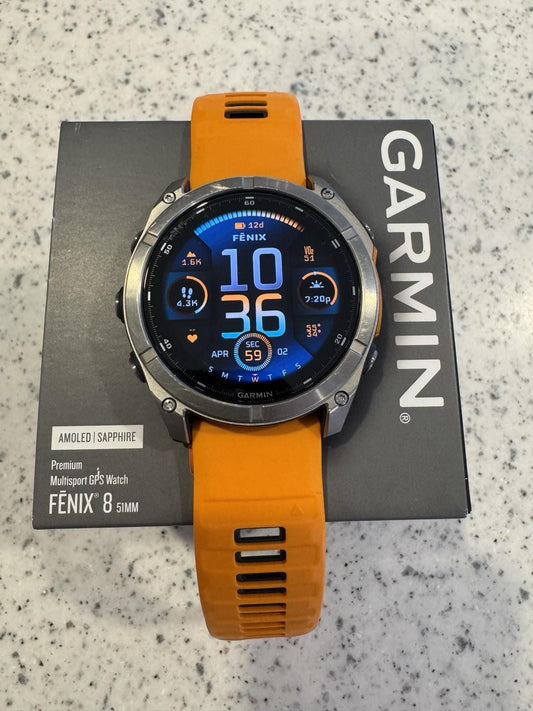 Garmin fenix 8 Amoled Sapphire 51 mm Watch Titanium w Spark Orange Silicone Band